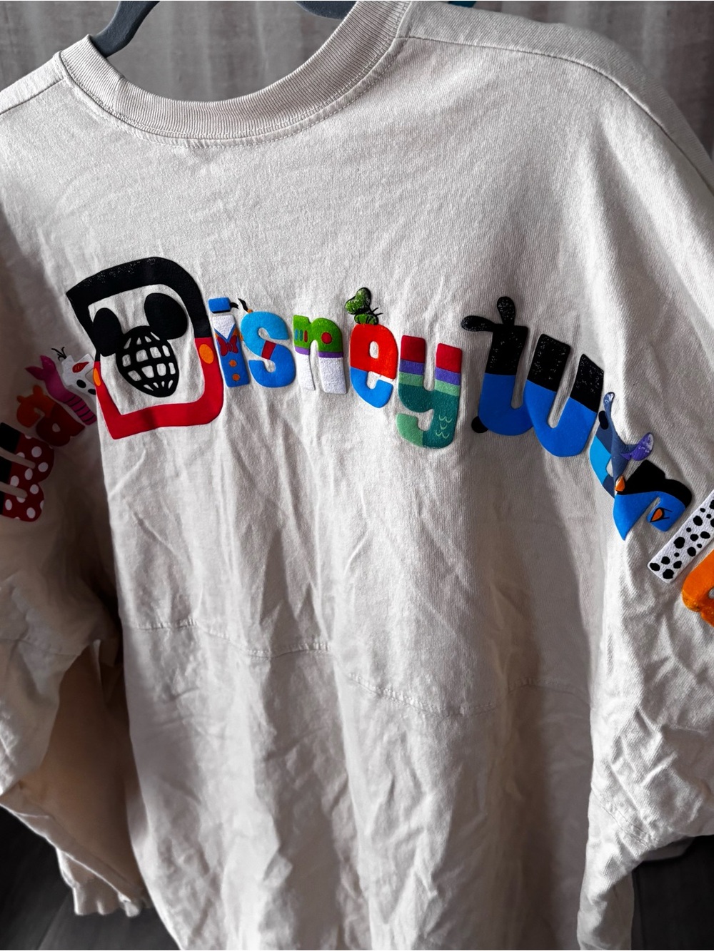 Disney World Spirit Jersey cream with character Graphic Letters